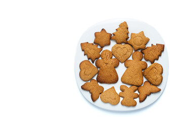Gingerbread on plate. Christmas food with copy space.