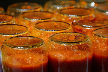 Homemade tomato sauce in the jars traditional prep for the winter months
