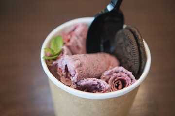 ice cream in a cup with cookies