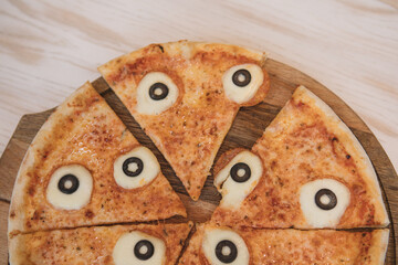 pizza with olives and cheese