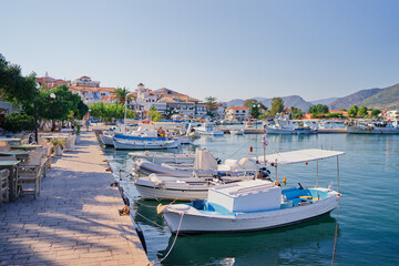 Fototapeta na wymiar Harbor with leisure and fishing boats at anchor, Greece.