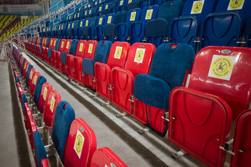 locked chairs at the stadium during the pandemic keep your distance don't sit here