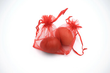 Chinese red eggs over white background