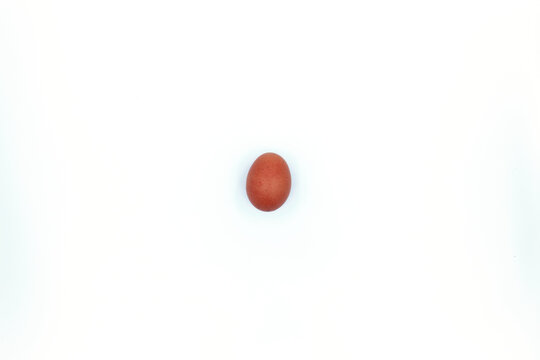 Chinese red egg over white background