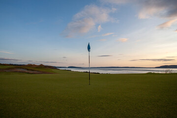 Fototapeta na wymiar golf course at sunset