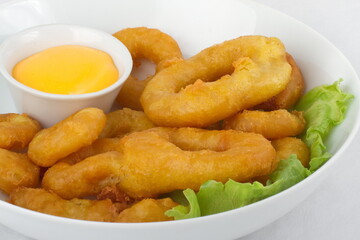 Tempura squid rings with cheese sauce