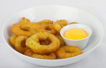 Tempura squid rings with cheese sauce