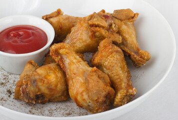 Buffalo chicken wings with ketchup