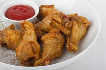 Buffalo chicken wings with ketchup