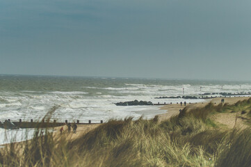 View on the North Sea at Horsey Gap. Waves and groins in Norfolk. East coast of UK. photographed n...