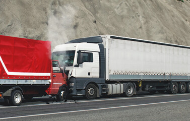 Road accident. Frontal collision between two trucks