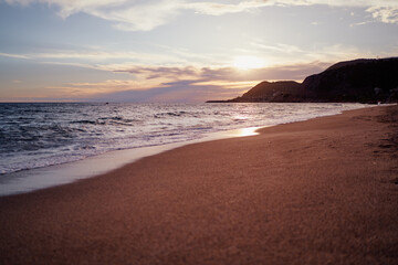 Fototapeta na wymiar Beautiful landscape. Sea beach at sunset time.