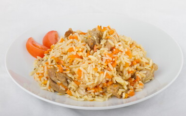 Uzbek pilaf on a white plate
