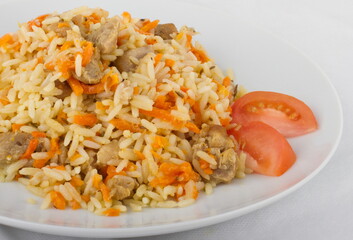 Uzbek pilaf on a white plate