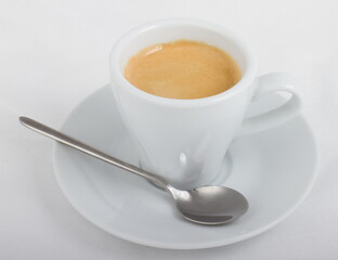 Espresso coffee in a white Cup
