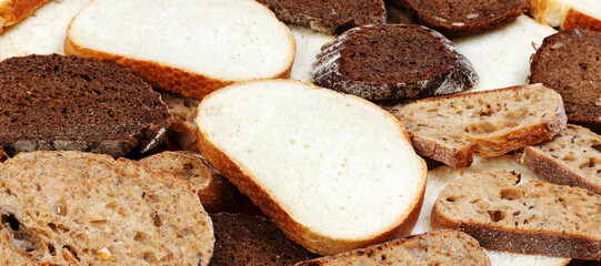 Sliced white and brown loaf of bread