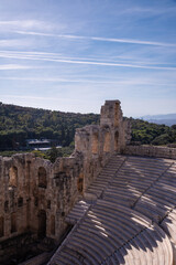 Ancient Odeon of Herodes Atticus theater - amphitheater of Acropolis of Athens, Greece.Landmark of Greece. Scenic view of Ancient Greek ruins overlooking Athens city.