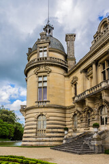 Architectural fragments of famous Chateau de Chantilly (Chantilly Castle, 1560) - a historic chateau located in town of Chantilly, Oise, Picardie, France.