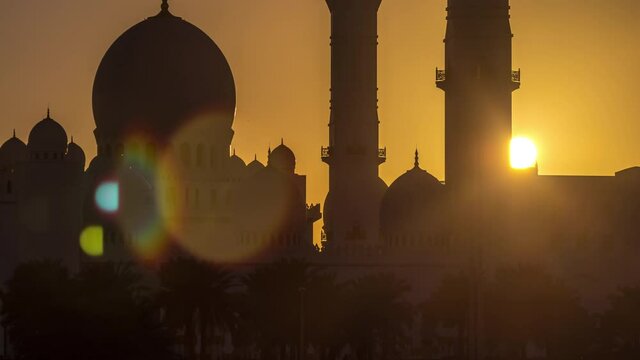 Sheikh Zayed Grand Mosque in Abu Dhabi at sunset timelapse, UAE. Evening close up view from Wahat Al Karama