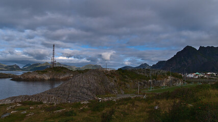 Rocky coast in south of fishing village Henningsvær, Austvågøya island, Lofoten, Norway with...