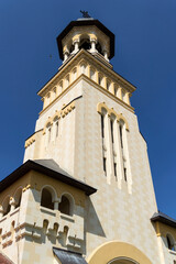 Fototapeta na wymiar The Coronation Archbishop Cathedral tower. Alba Iulia, Alba Carolina fortress, Romania.
