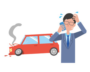 事故を起こして焦りながら電話する男性
