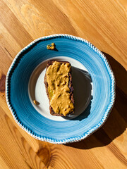 Banana Bread Slice with Creamy Peanut Butter Cream Paste.