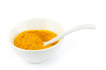 Bowl filled with turmeric powder