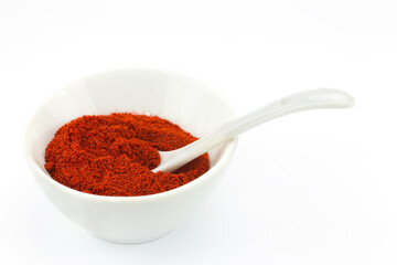 Bowl filled with red paprika powder