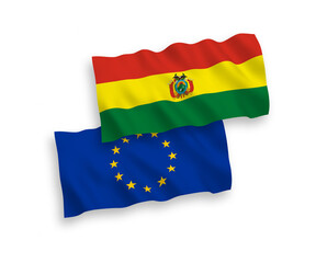 National vector fabric wave flags of European Union and Bolivia isolated on white background. 1 to 2 proportion.