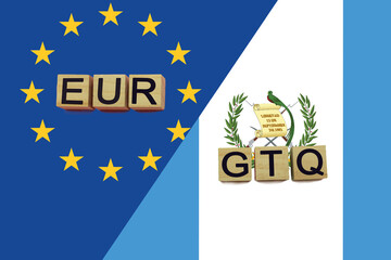 United Europe and Guatemala currencies codes on national flags background