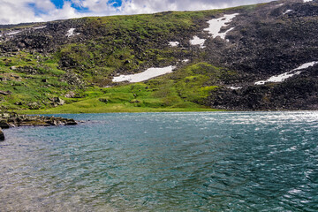 cold lake in the mountains on a summer day