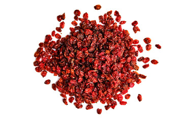 Heap of dry barberry on white