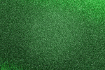 Blurred dark green glitter texture Christmas abstract background, shallow dof, large grain. Abstract texture and back ground for designers.