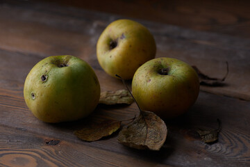 apples on a wooden table