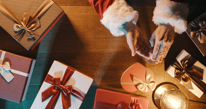 Santa Claus Applying Hand Sanitizer And Disinfecting His Hands