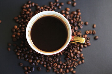 black natural coffee and roasted coffee beans