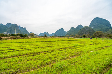 Obraz premium Mountains and farmland in Guilin, Guangxi Province, China