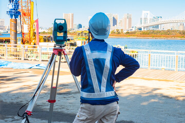 Construction of a pier near the Rainbow bridge in Japan. A new pier is being built in Tokyo. The...