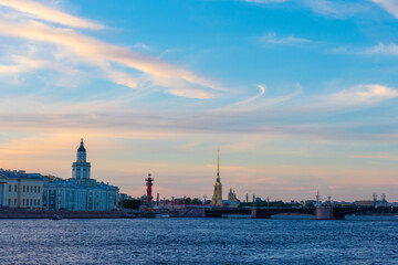 Fototapeta premium Saint Petersburg. Russia. The sky with clouds of unusual shape over the center of St. Petersburg. Vasilievsky island. Palace bridge. Kunstkammer. Petropavlovskaya fortress. Rostral column.