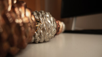 Christmas toys close-up. Toy cones on a white table.