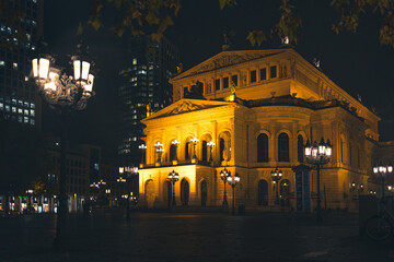 The old opera house in Frankfurt, Germany, lighted in orange