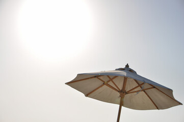 parasol in the sun on bright background