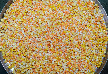 A pile of urad, masoor, toor or arhar, chana dal or lentils mixture.