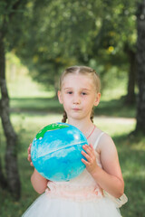 Little girl playing in the city park