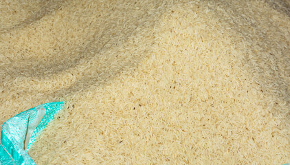 Pile of brown color rice texture background.
