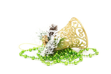 Fototapeta premium Christmas decoration in the form of a garland and golden Christmas bell isolated on a white background. Christmas tree toy. New year background.