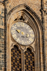 Close up view of clock on the tower of St. Vitus Cathedral in Prague, Czech republic