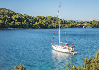 A yacht docked in the harbour of the island of Mljet, Croatia