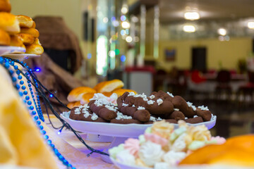 Served tasty bakery products close up view